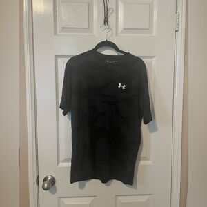 Men’s medium Under Armor workout shirt.